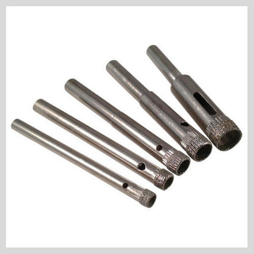 Diamond drill bit for outlet steel