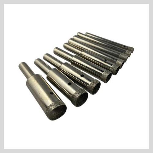 Thin wall diamond core drill bits for extracting a core
