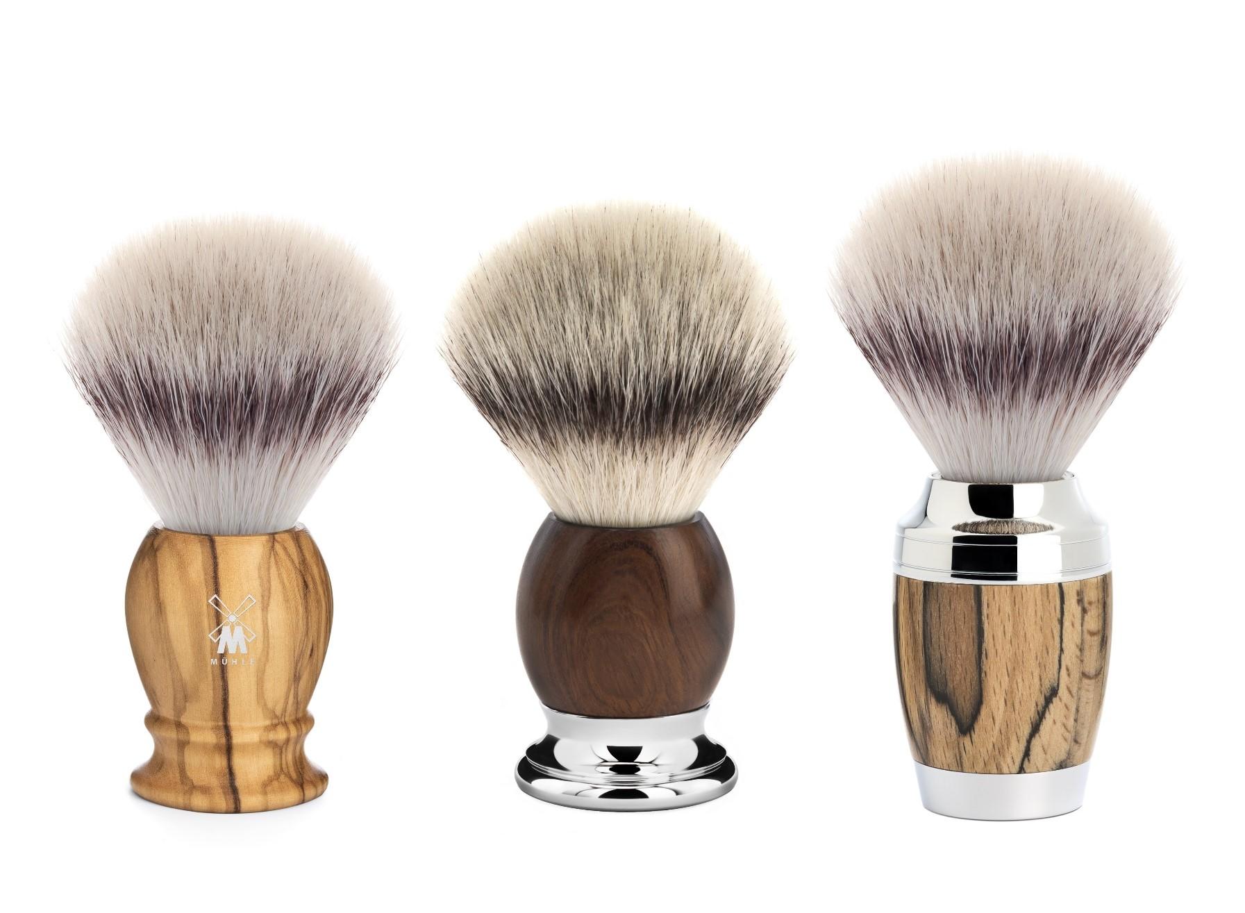 From left to right: The new Olive Wood CLASSIC brush in Silvertip fibre, SOPHIST Ironwood in Silvertip Fibre and STYLO Spalted Beechwood in Silvertip Fibre.