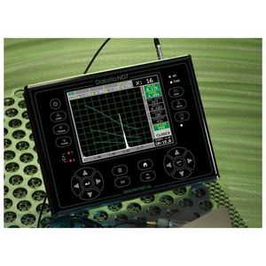 Dakota FX81-DL Benchtop Flaw Detector shown in use on a green metalic background