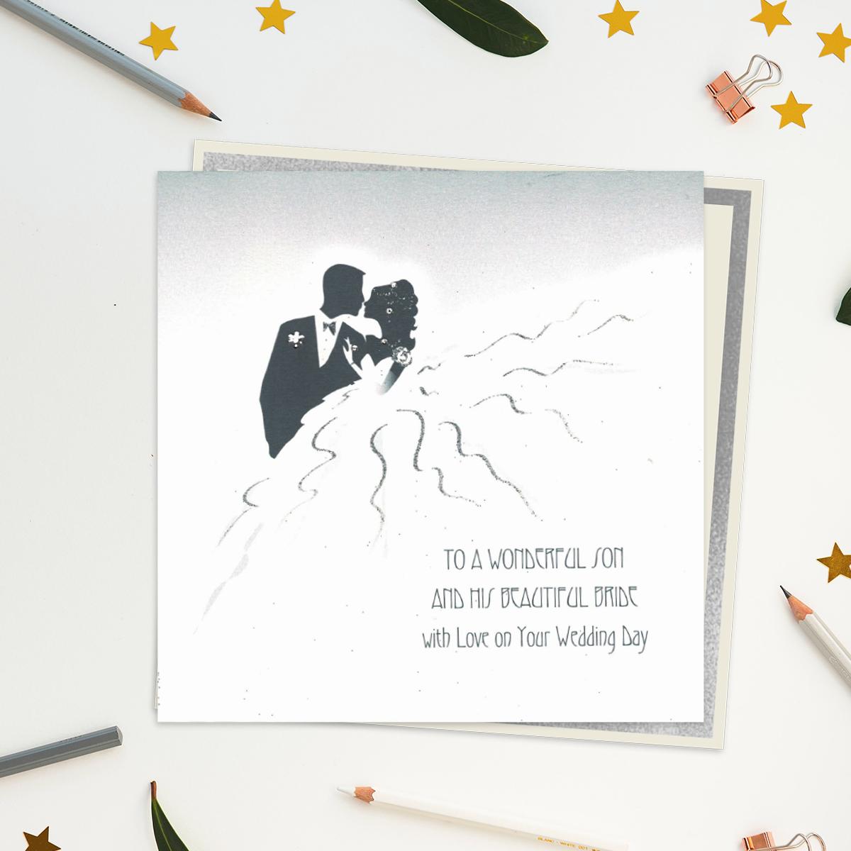 Stunning, Luxury, Handcrafted Wedding Day Design For Son And His Beautiful Bride. Image Of Couple In Silhouette With Added Jewel Embellishments. Blank Inside For Own Message. Warm White Envelope With Silver Border
