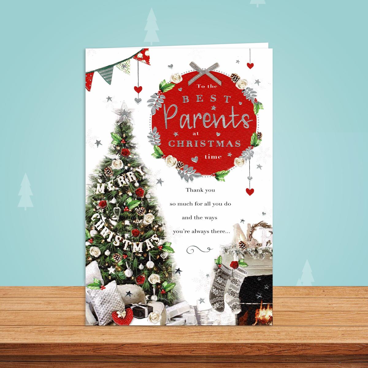 Best Parents Christmas Card Alongside Its Red Envelope