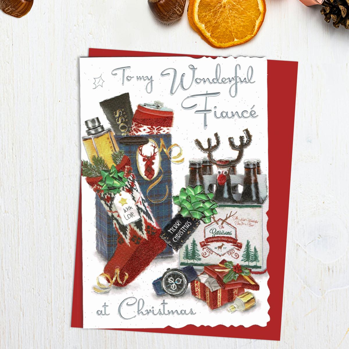 Fiancé Christmas Card Alongside Its Red Envelope