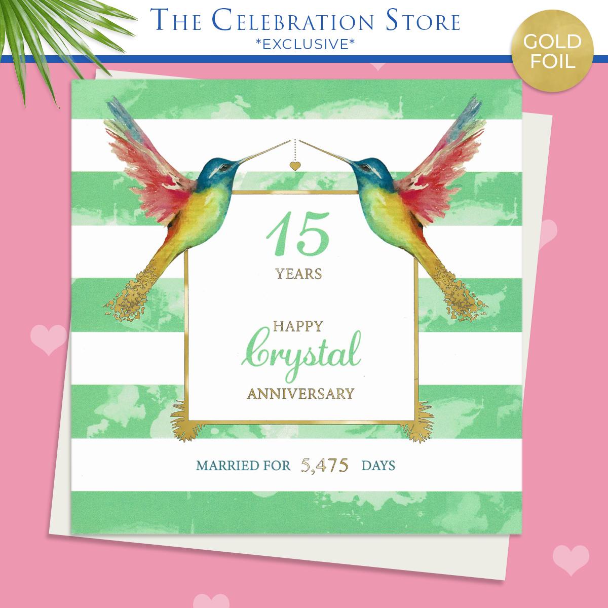 Crystal Hummingbird Anniversary Card Displayed On A Wooden Shelf