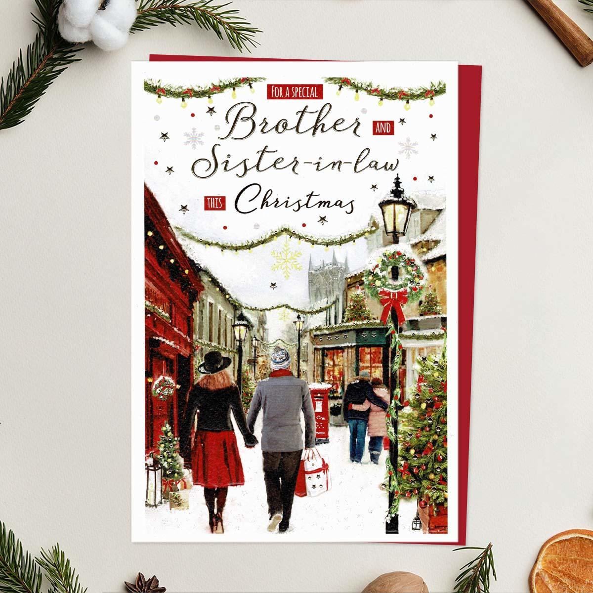 To A Special brother and Sister In Law Christmas Card Featuring Puppies By The front Door! Finished With Silver Foiled Lettering, Red Glitter Detail, Red Envelope And Printed Insert