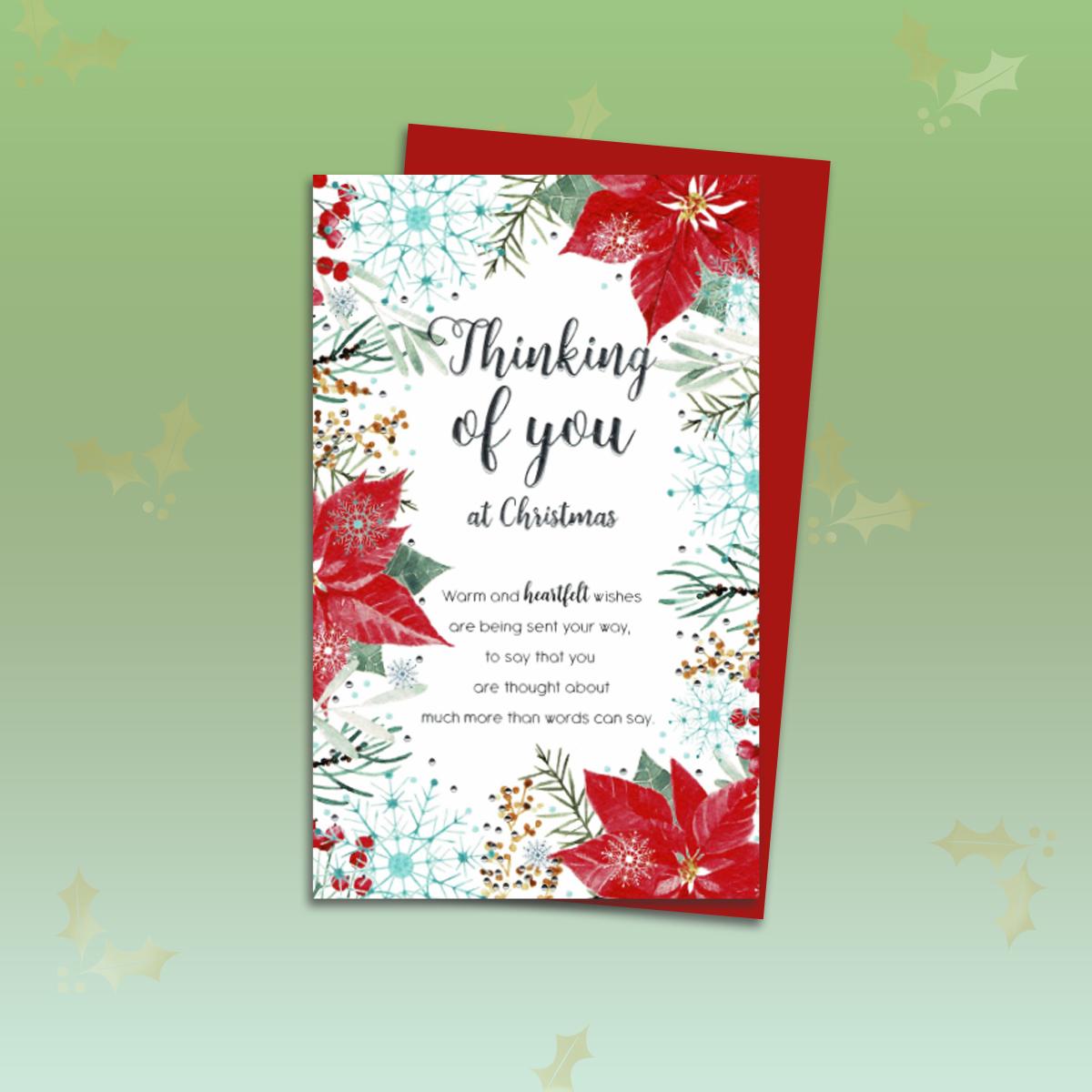 Thinking Of You Christmas Card Alongside Its Red Envelope