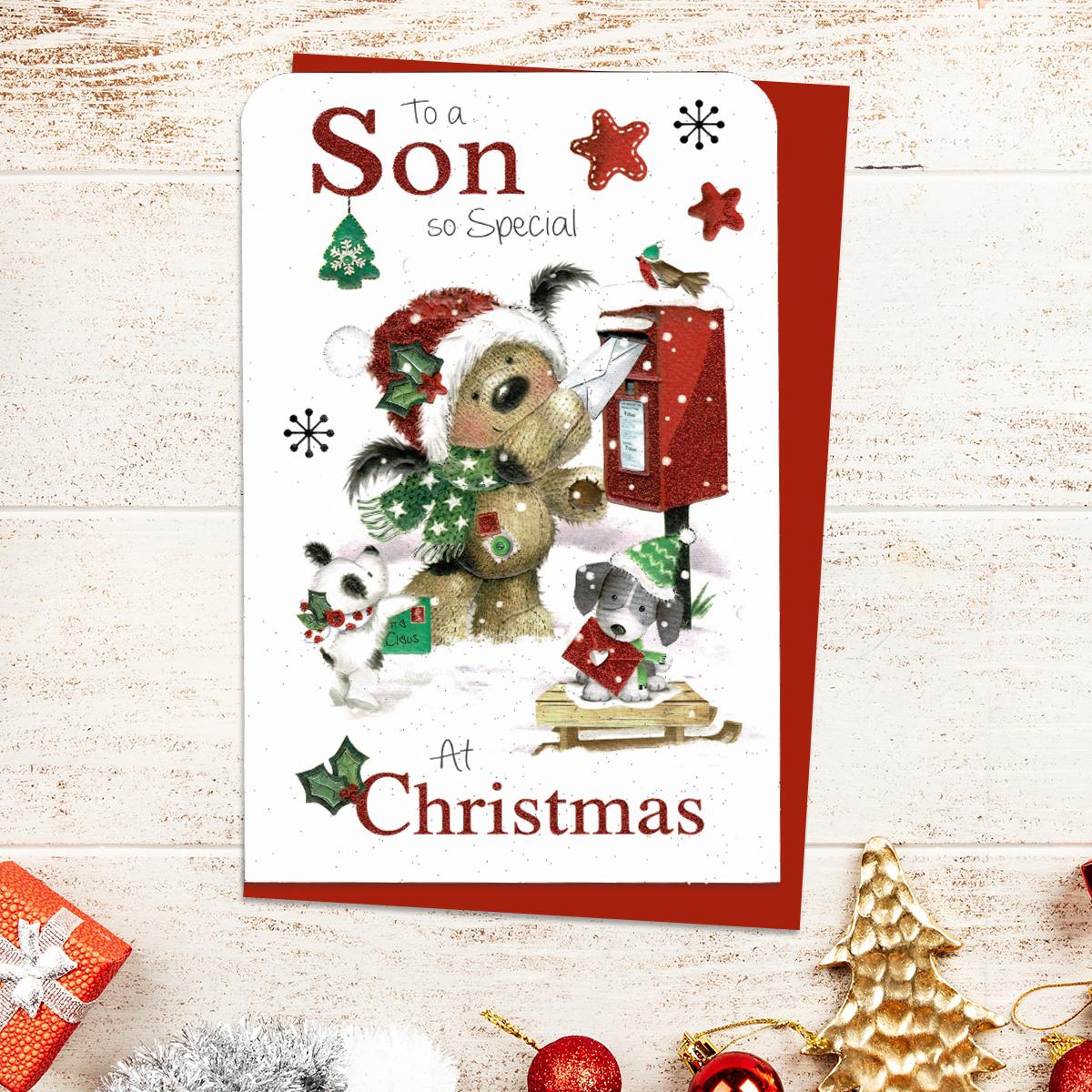 Son Christmas Card Alongside Its Red Envelope