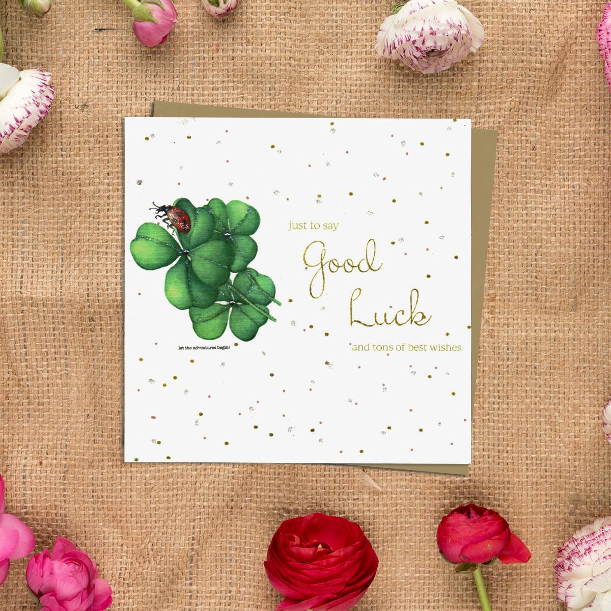 Good Luck Greeting Card Alongside Its Kraft Envelope