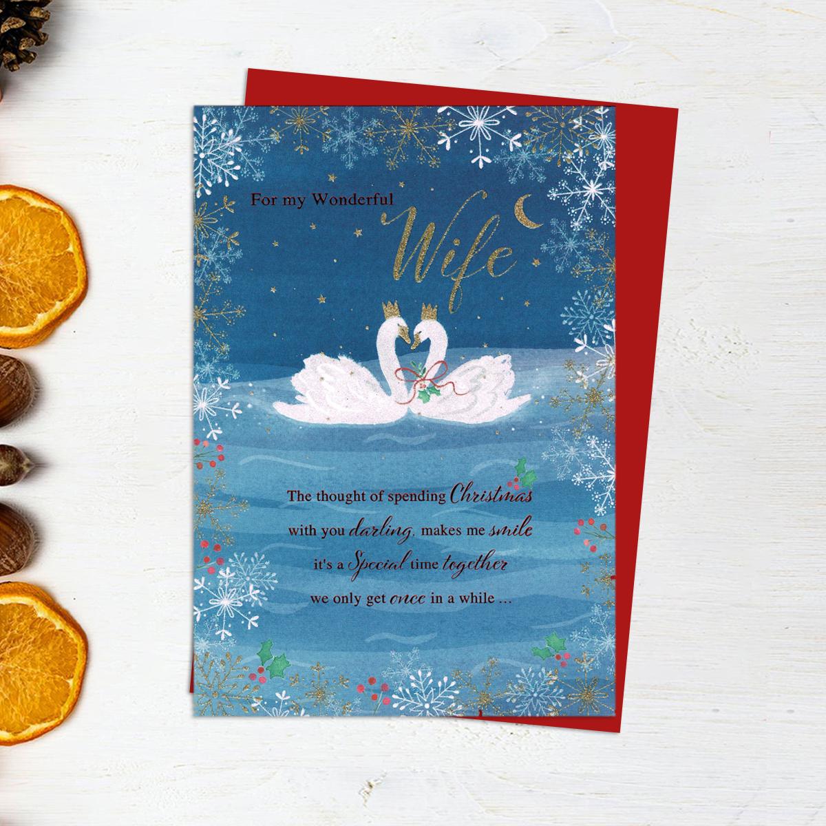 For My Wonderful Wife Featuring Verse And Two Christmas Swans. Finished With Red And Gold Foiling Detail And Sparkle. A Red Envelope Completes the Design!