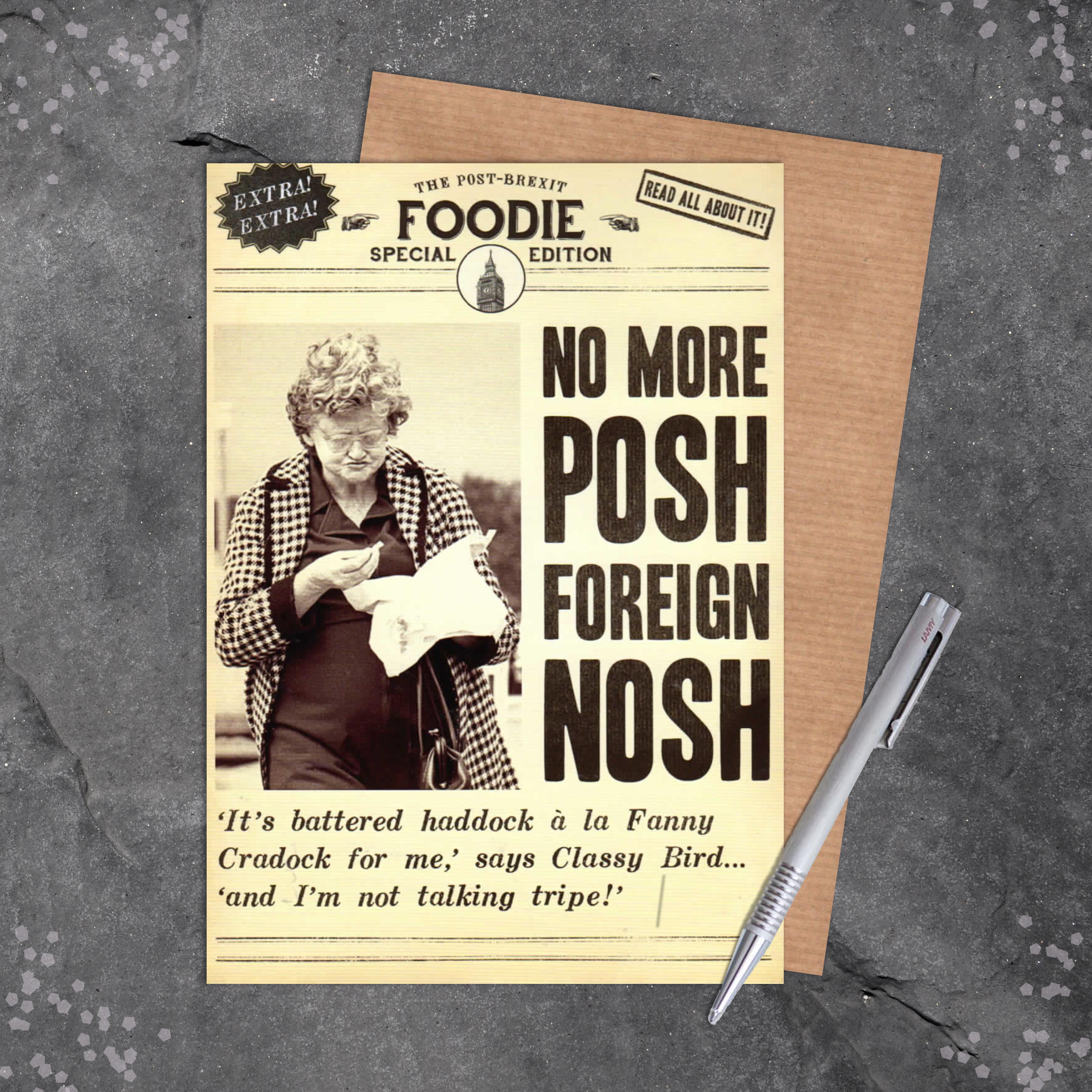 Posh Nosh Funny Birthday Card Sitting On A Display Shelf