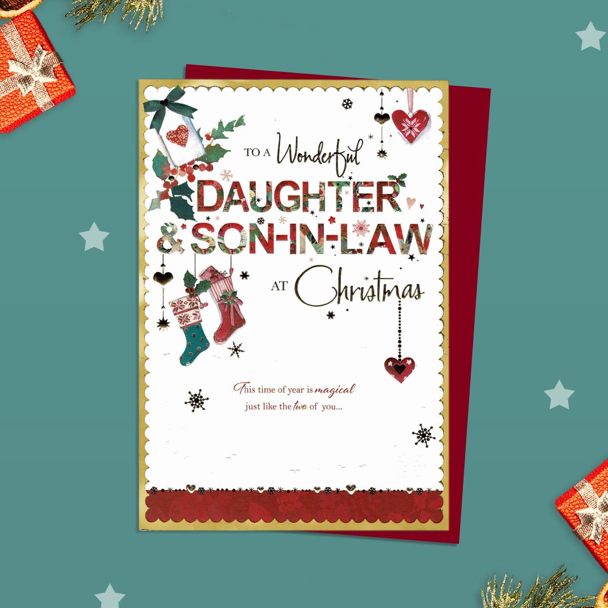Daughter And Son In Law Christmas Card Alongside Its Red Envelope