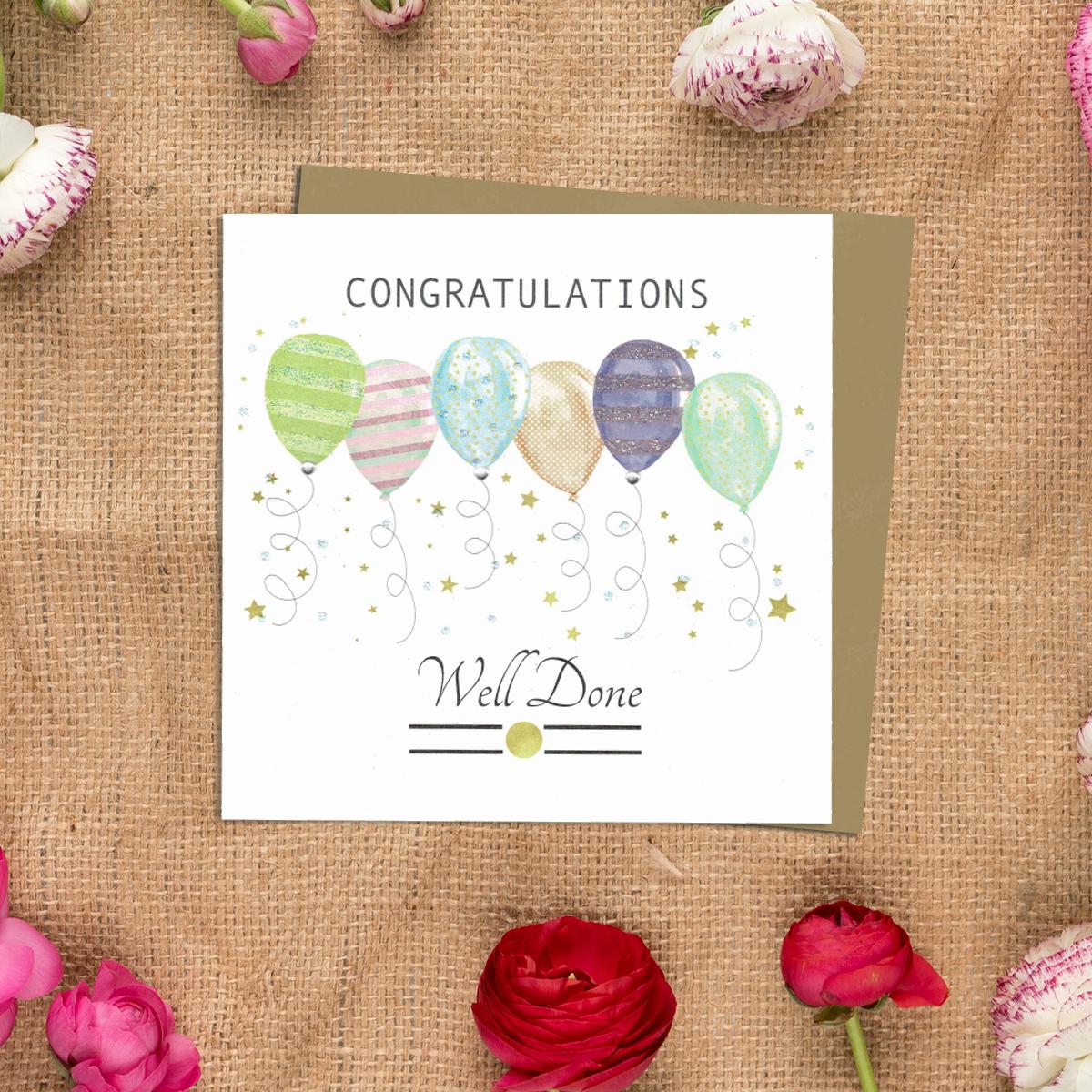 Congratulations Balloons Greeting Card Alongside Its Kraft Envelope
