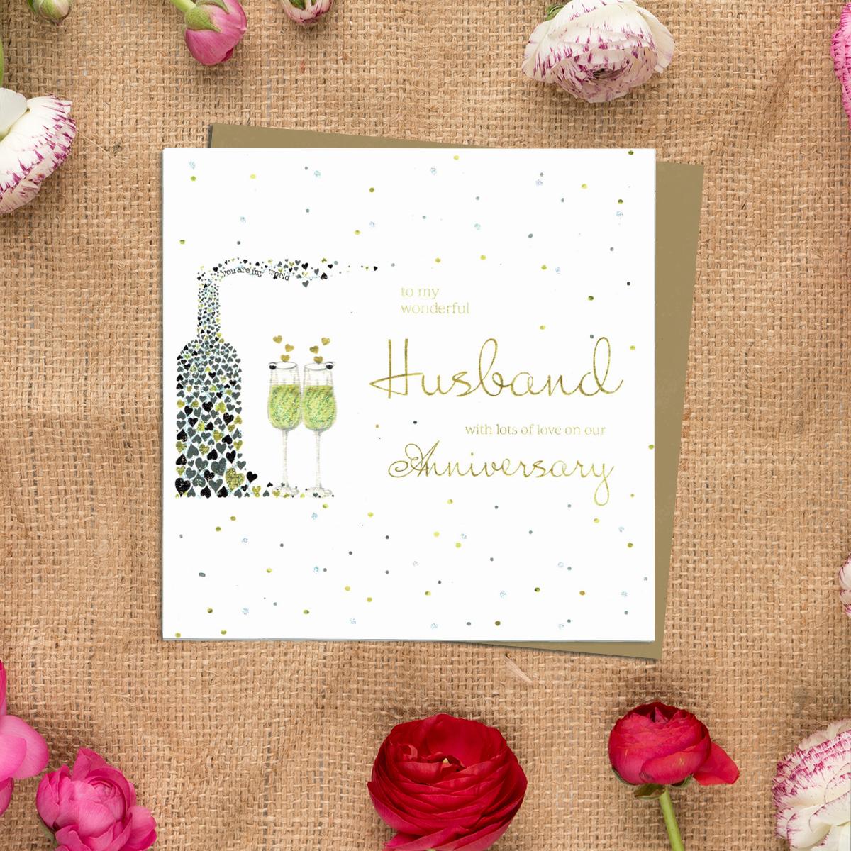 Husband Anniversary Card Alongside Its Kraft Envelope