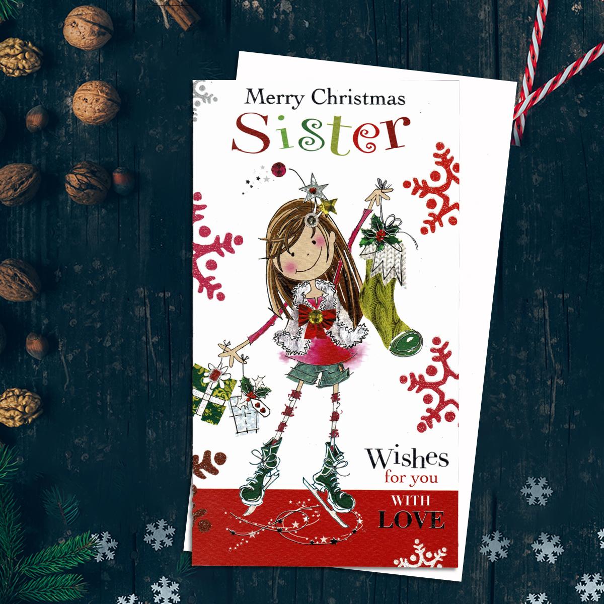 Merry Christmas Sister Wishes For You With Love Featuring A Quirky Young Lady On Ice Skates With Christmas Stocking And Gifts. Finished With Silver Foil Detail And Added Sparkle