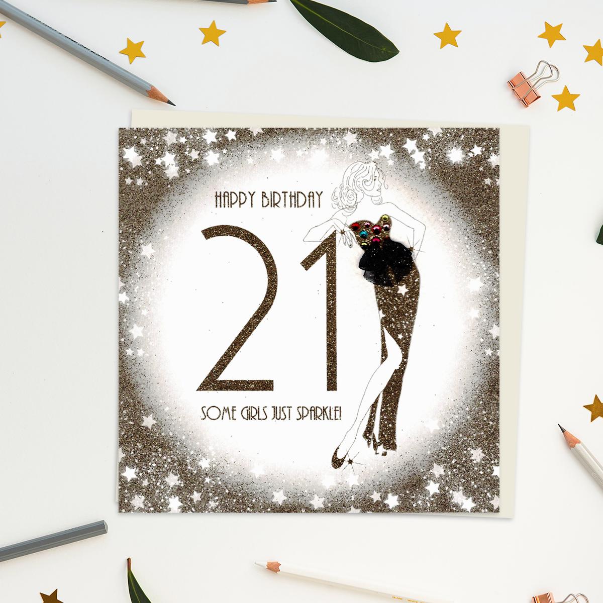 A Luxury Handcrafted Design From Five Dollar Shake Showing A Woman Leaning On The Number 21. Made From Embossed Card With Gold Glitter Accents, Gem Embellishments And Additional Attachments. Blank Inside For Your Own Message. Complete With Ivory Envelope