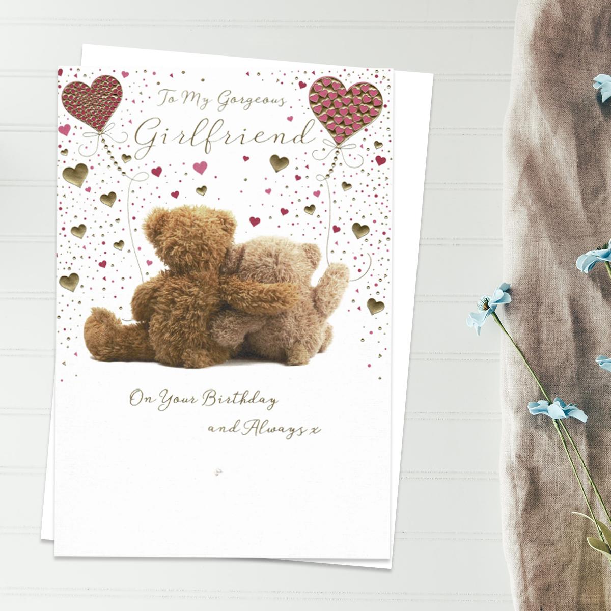 To My Gorgeous Girlfriend On Your Birthday And Always Featuring two Teddies Holding Balloons. With Added Gold Foil Detail And White Envelope