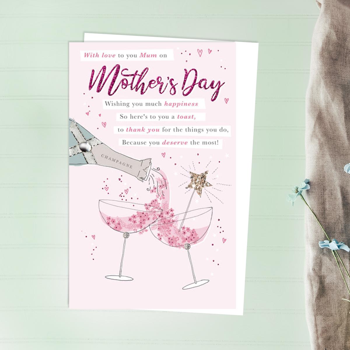 Champagne Toast Mother's Day Design Alongside Its White Envelope