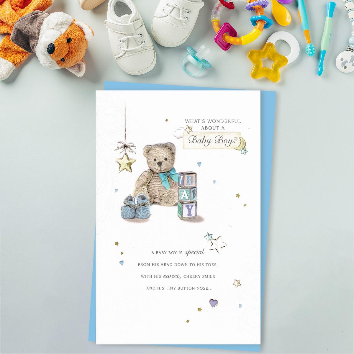 Baby Boy Sentimental Greeting Card Alongside Its Light Blue Envelope