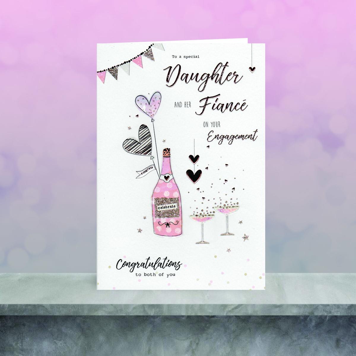 Daughter And Fiancee Engagement Card Sitting On The Shelf