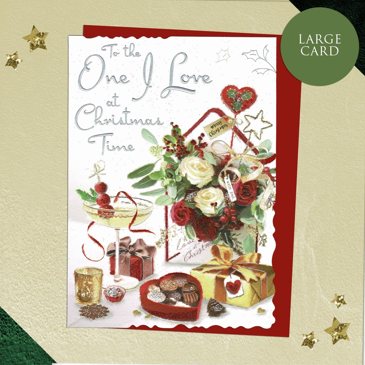 To The One I Love At Christmas Time Large Card Showing Flowers, Chocolates And Gifts. Enhanced With Red Glitter and Silver Lettering And Finished With A Red envelope