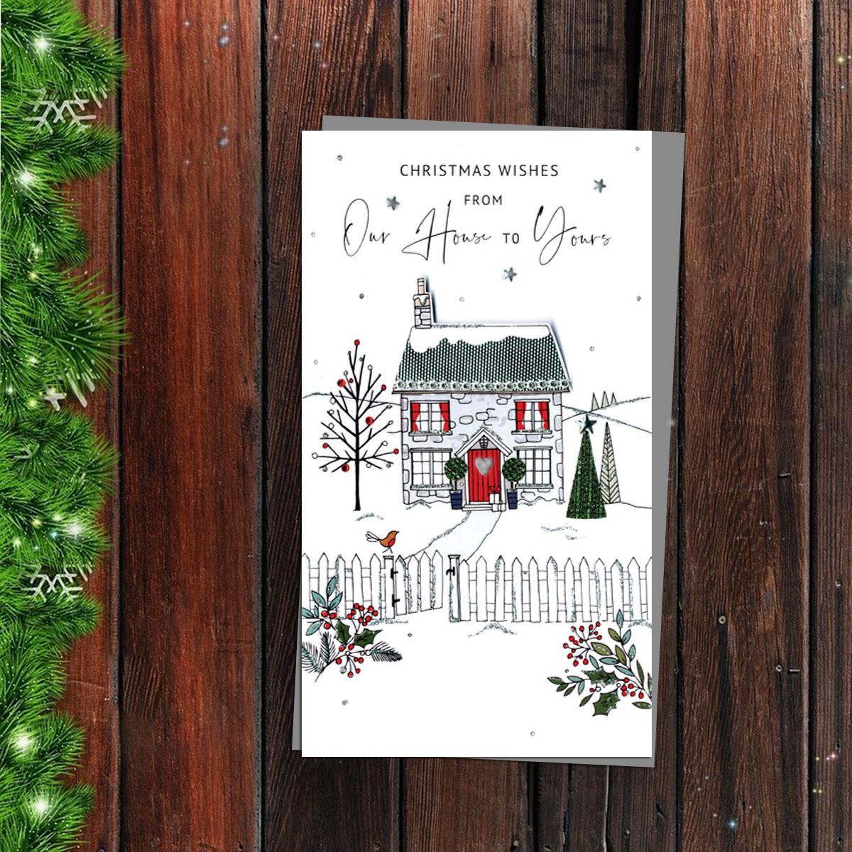Our House To Yours Christmas Card Alongside Its Silver Envelope