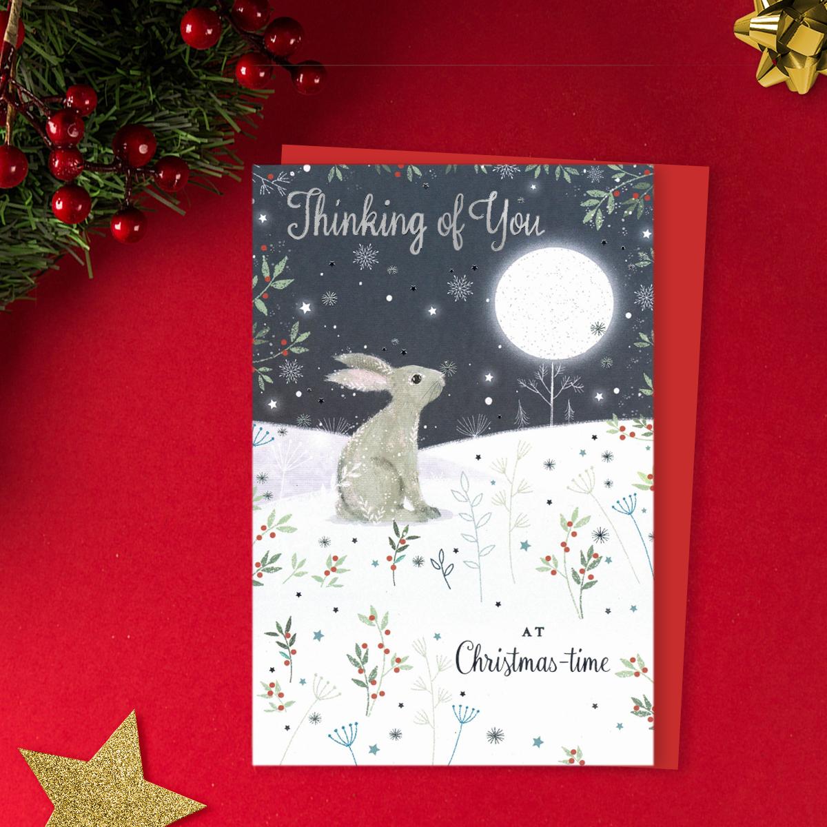 Thinking Of You At Christmas Time Featuring A Rabbit Looking At the Full Moon. Finished With Sparkle, Silver Foil Details And Red Envelope