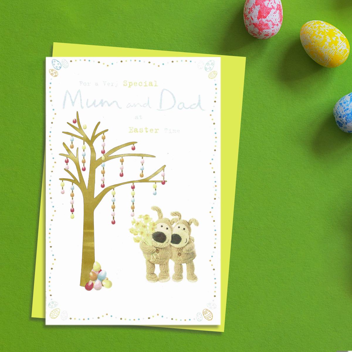 ' For A Very Special Mum And Dad At Easter Time' Card Featuring Boofle Bear With a Tree Filled With Hanging Easter Eggs! Complete With Yellow Envelope