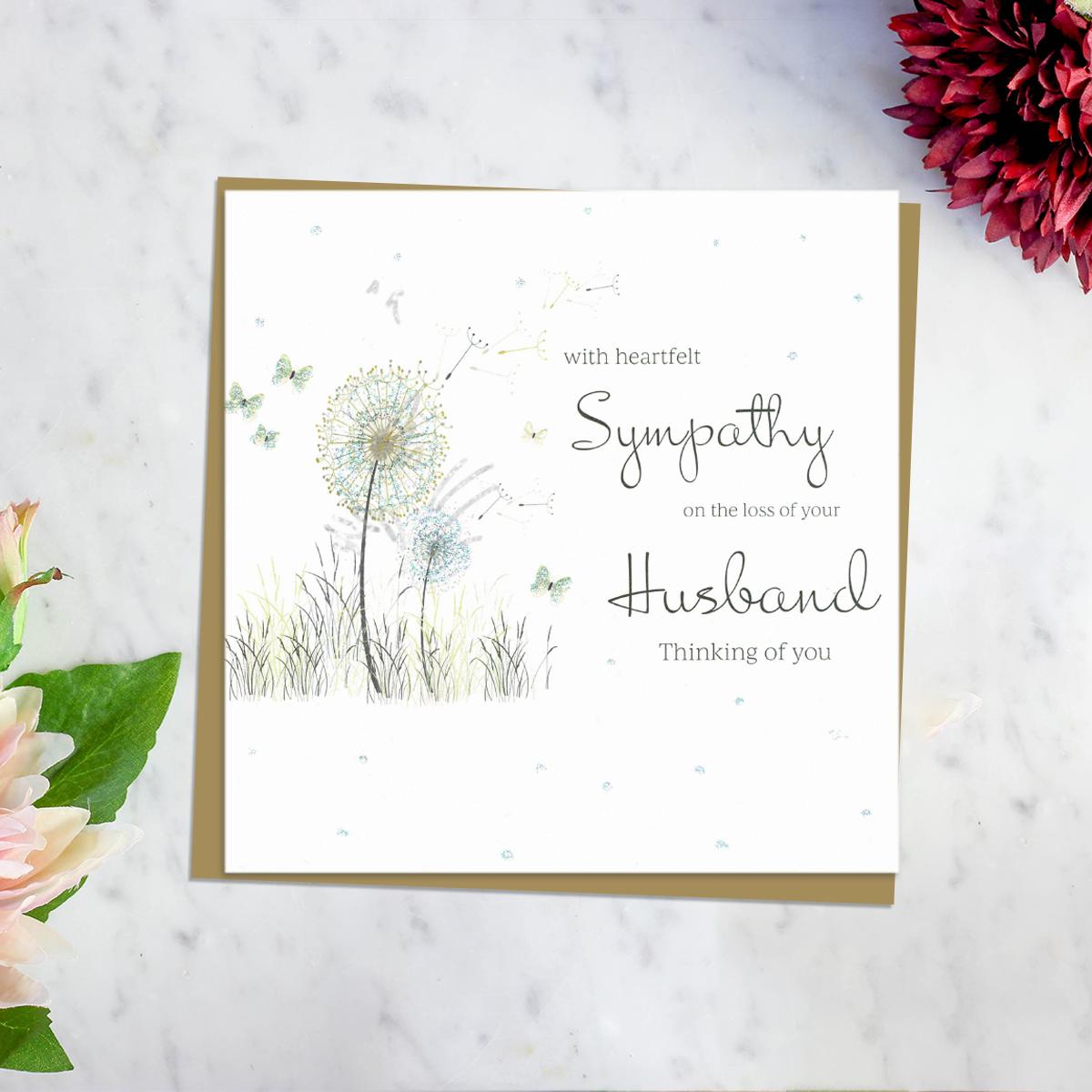 ' With Heartfelt Sympathy On The Loss Of Your Husband Thinking Of You' Card Featuring A Dandelion Blowing In The Wind With Surrounding Butterflies. Blank Inside For Own Message And Complete With Brown Envelope