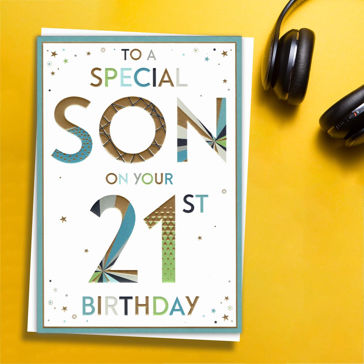 ' To A Special Son On Your 21st Birthday' Card Featuring Multi Coloured Lettering With Gold Foil Detail. Complete With White Envelope And Colour Printed Insert.