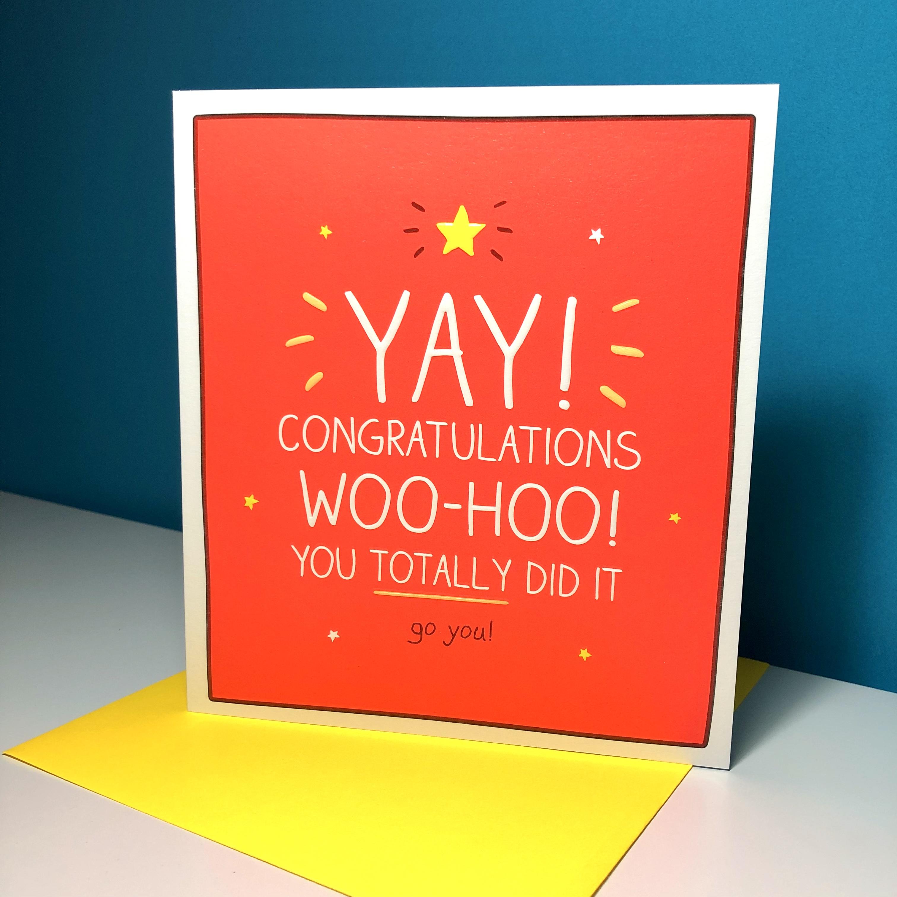 Congratulations Greeting Card Alongside Its Neon Yellow Envelope