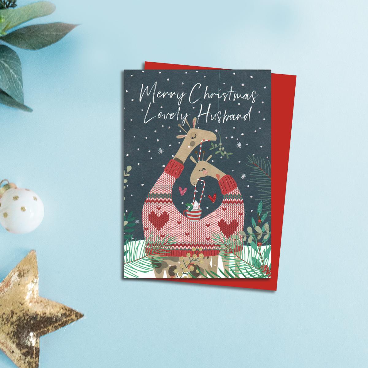 Husband Two Giraffes Christmas Card Alongside Its Red Envelope