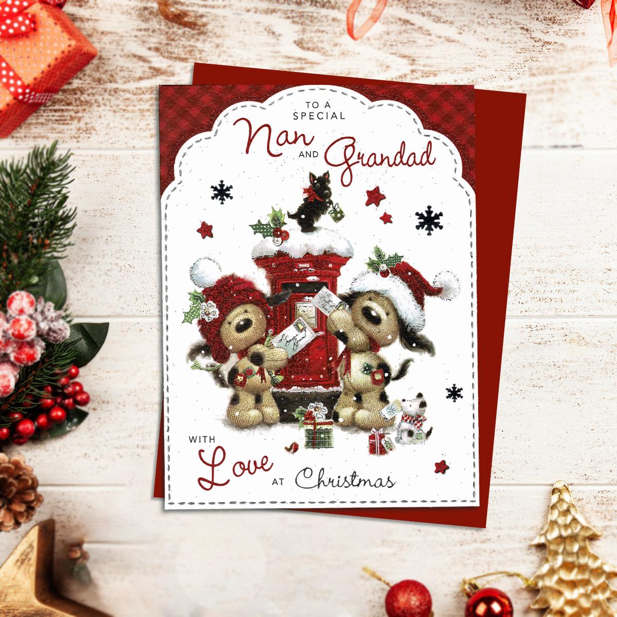 Nan And Grandad Christmas Card Alongside Its Red Envelope
