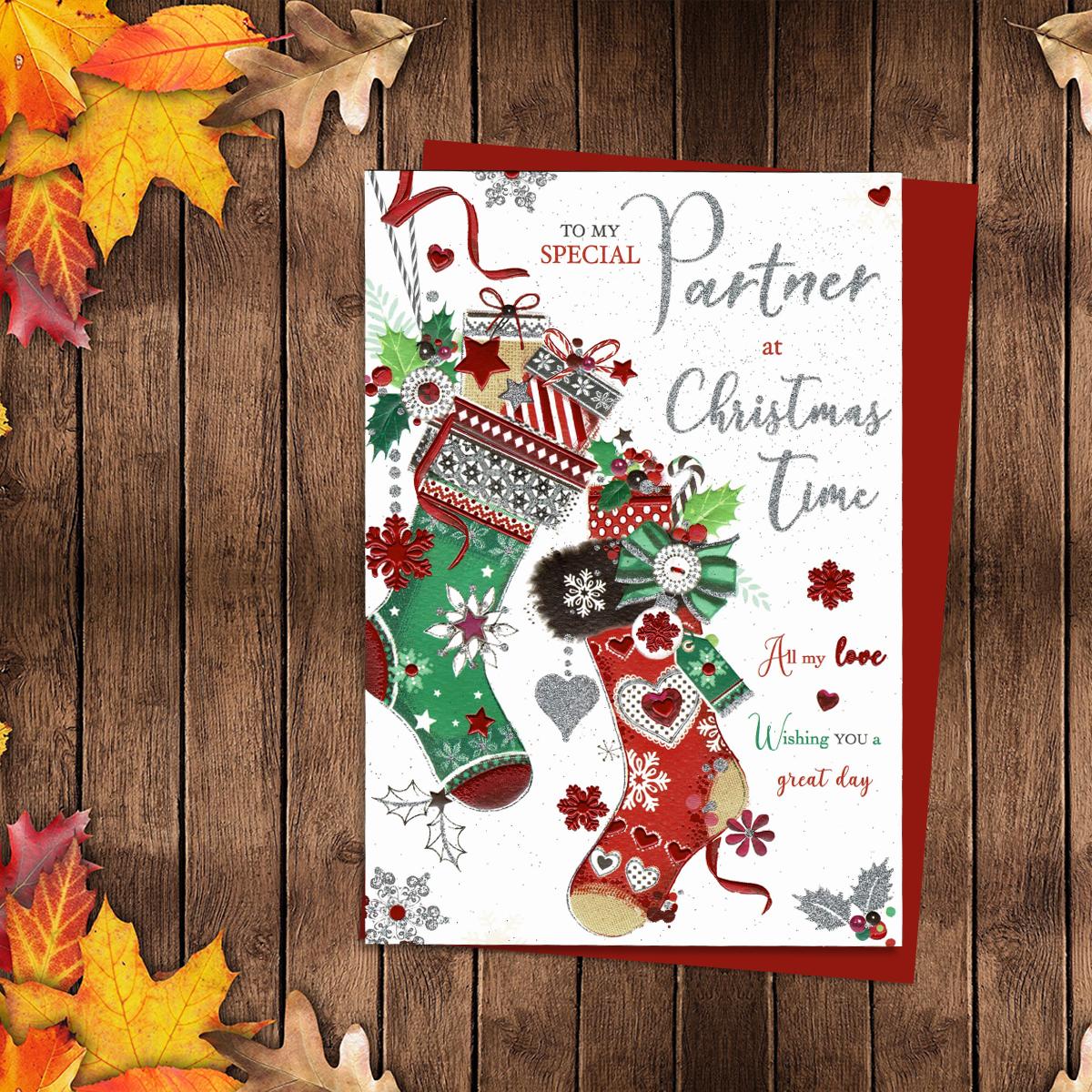To My Special Partner At Christmas Time Featuring Two Decorated Christmas Stockings. Finished With Silver Glitter detail And Red Envelope
