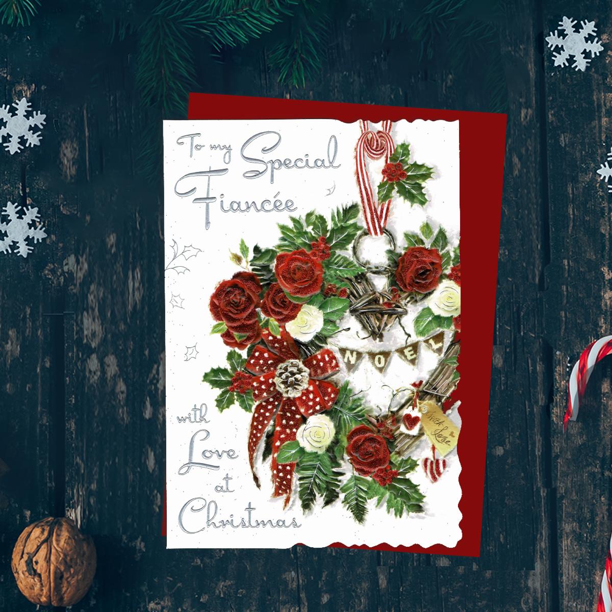 To My Special Fiancee With Love At Christmas Features A Beautiful  Wicker Heart Decorated With Roses, Ribbons And Cones. Finished With Silver Foil Lettering, Red Glitter And Red Envelope