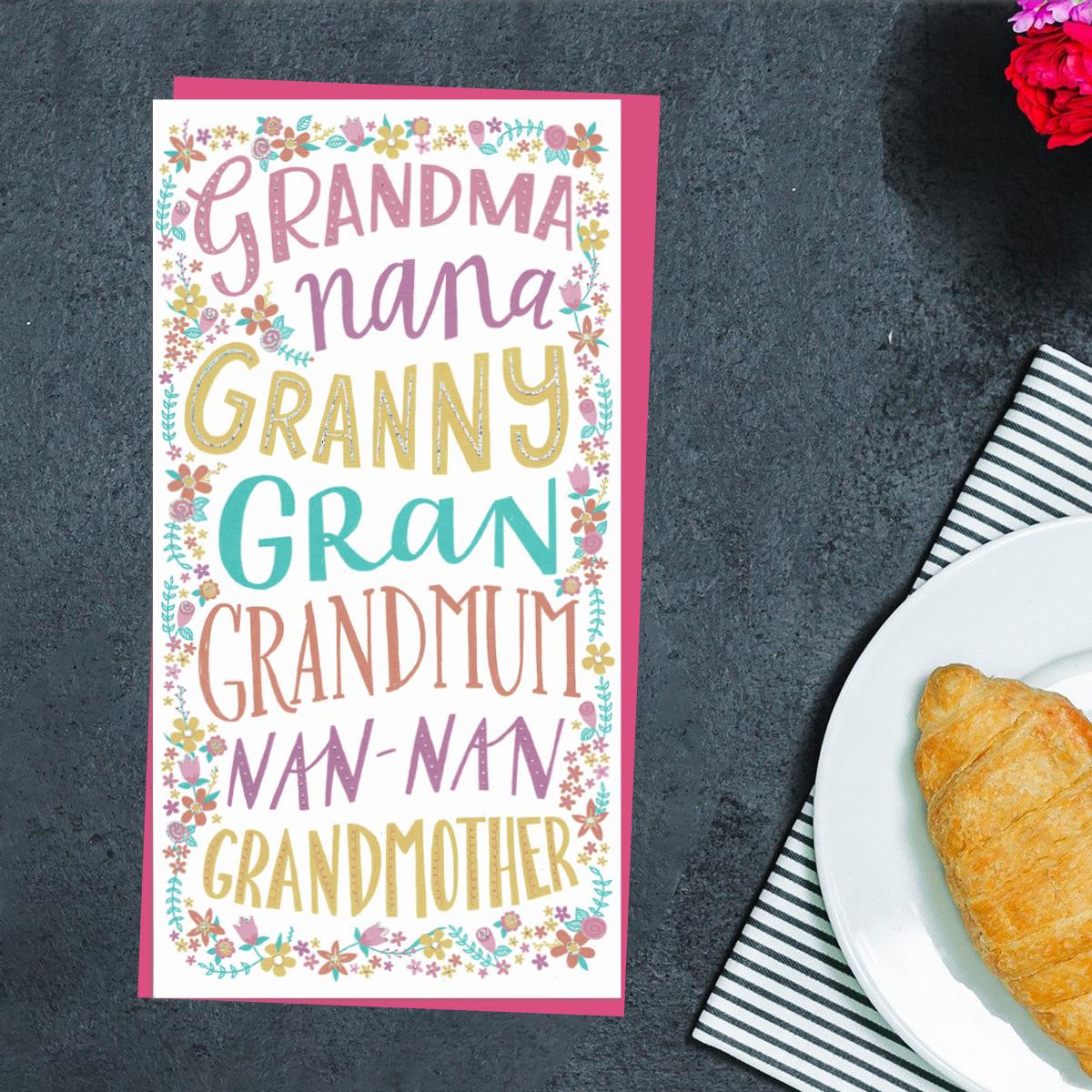 Multi-Captioned Grandparent Mother's Day Card Alongside Its Magenta Envelope
