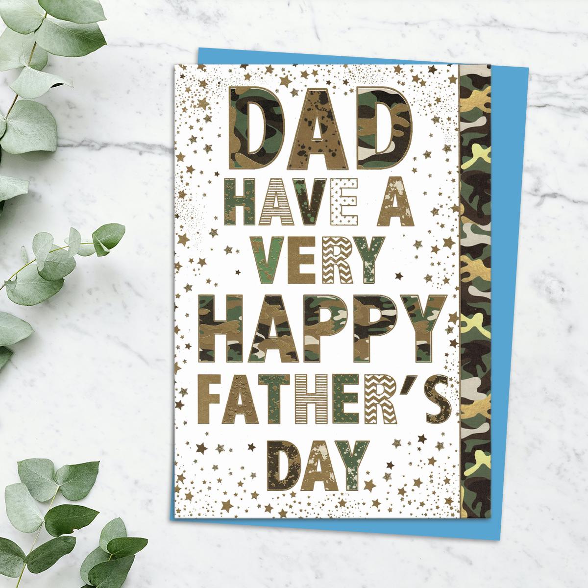 'Dad Have A Very Happy Father's Day' Card In Camouflage Text With Stunning Gold Foiled Detail. Complete With Blue Envelope