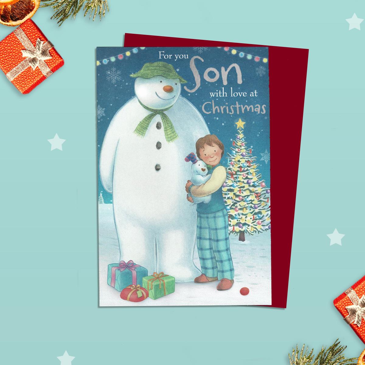 Son The Snowman Christmas Card Alongside Its Red Envelope