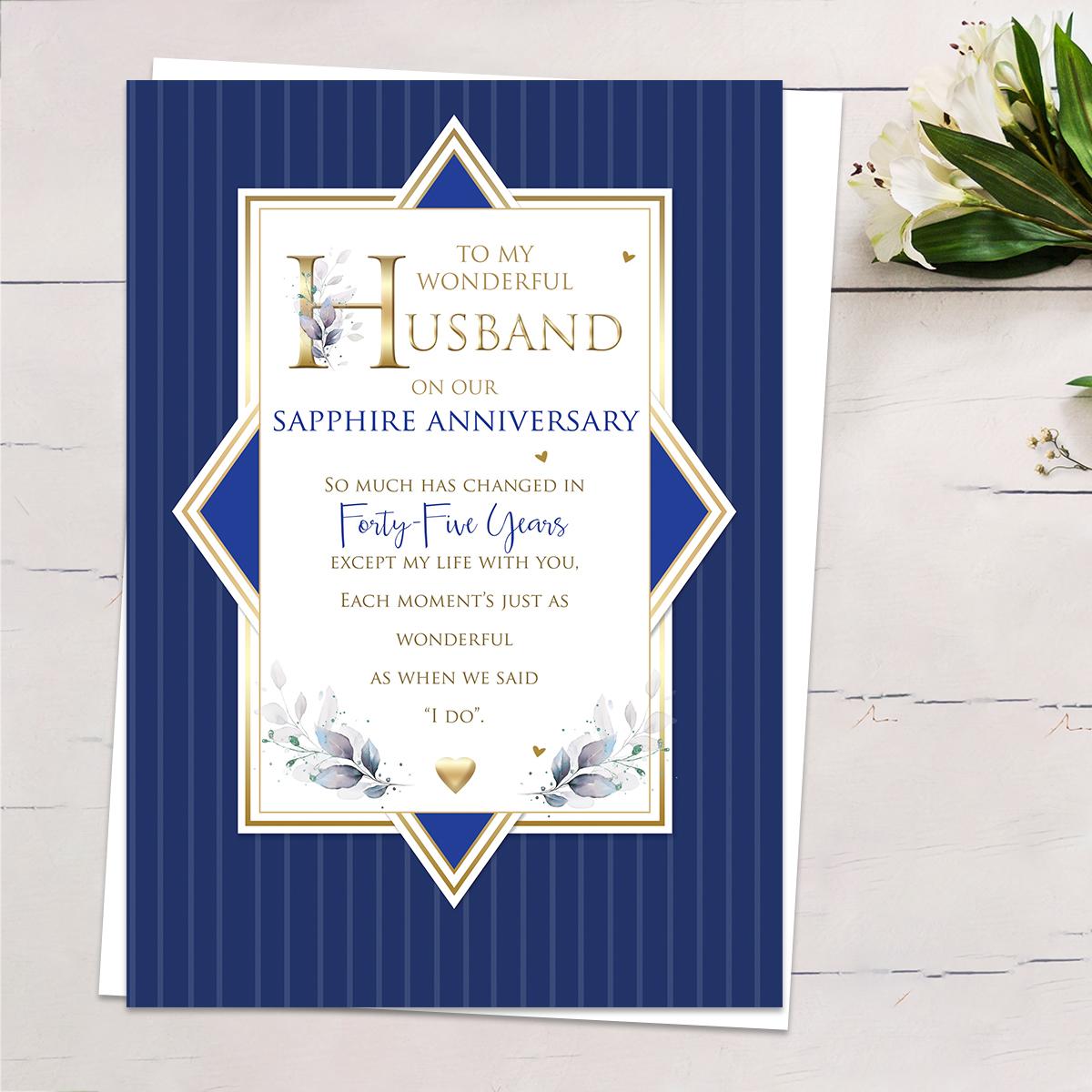 'To My Wonderful Husband On Our Sapphire Anniversary' Featuring A Navy Blue Front With Heartfelt Words Edged In Gold Foiling. Complete With White Envelope