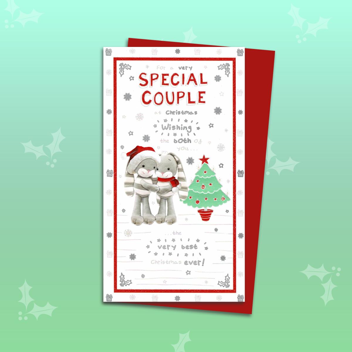Special Couple Christmas Card Alongside Its Red Envelope