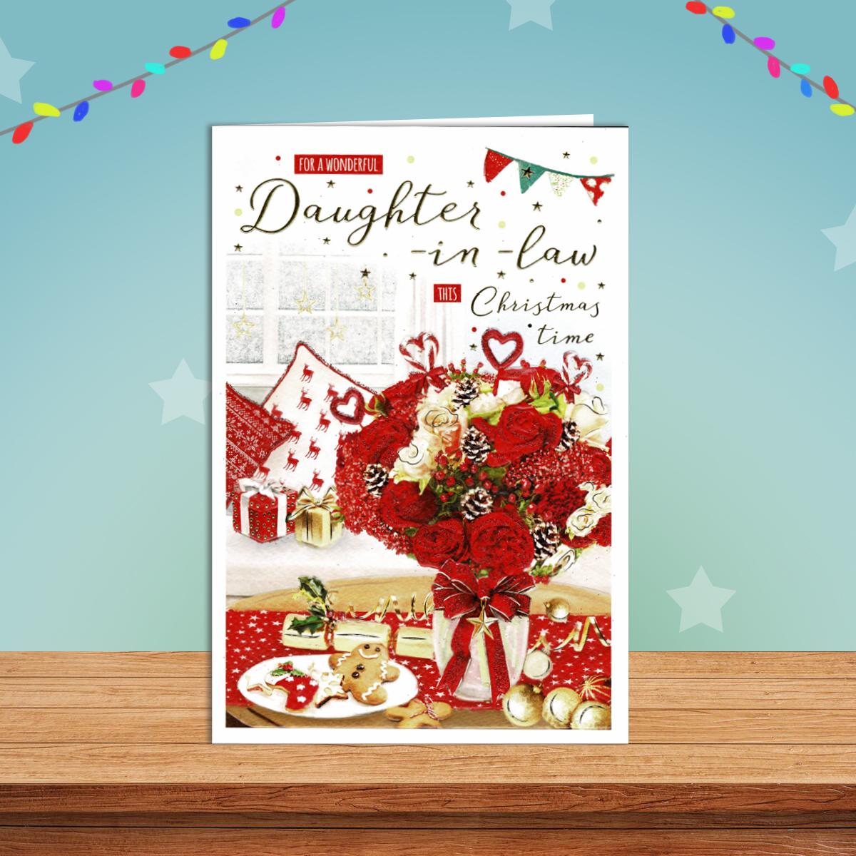 Daughter In Law Red Roses Christmas Card Alongside Its Red Envelope
