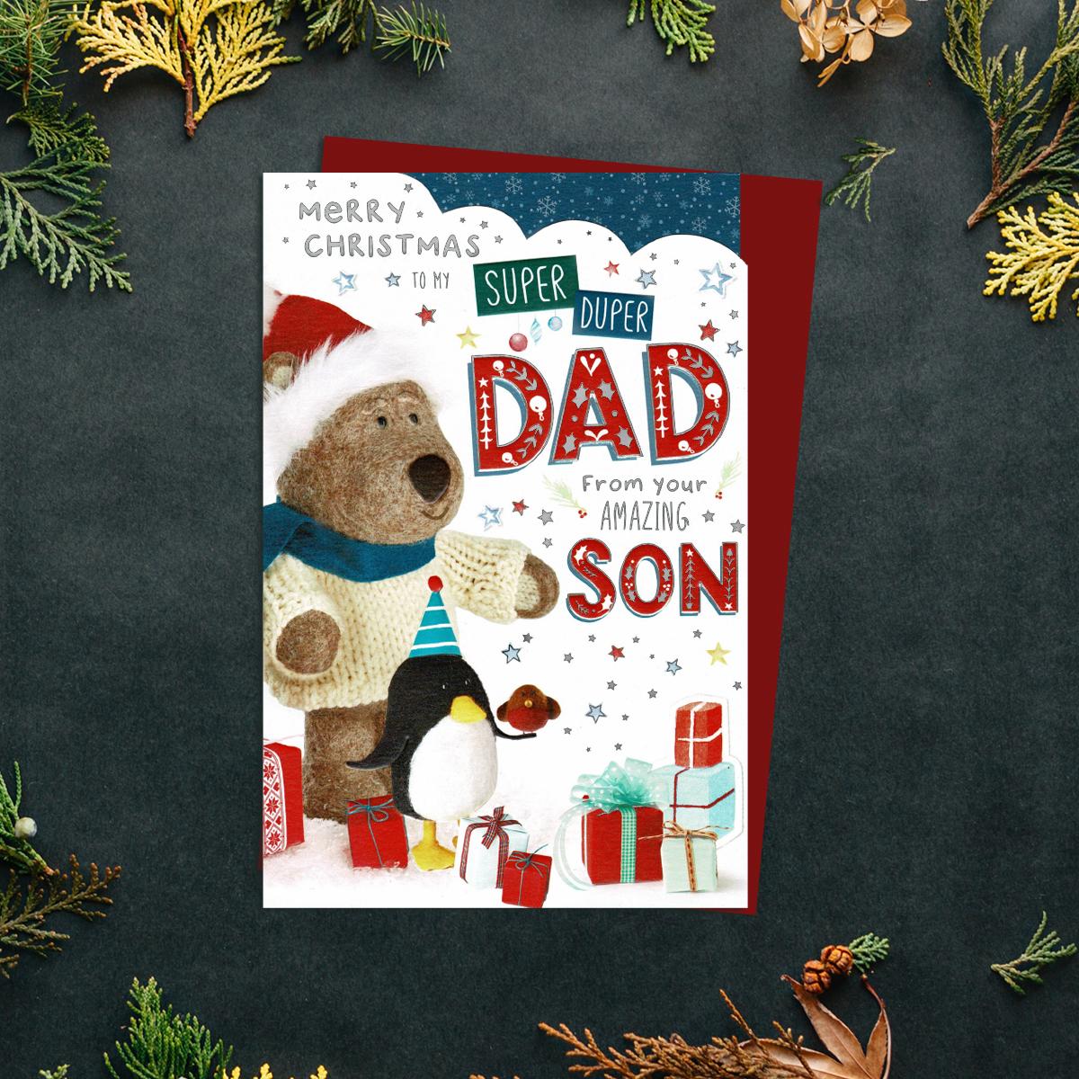 Dad From Son Christmas Card Alongside Its Red Envelope