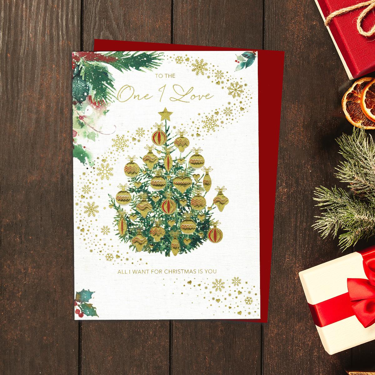 To The One I Love Christmas Card Showing An Elegant Christmas Tree Decorated With Gold Foil Baubles. Finished With A Red Envelope