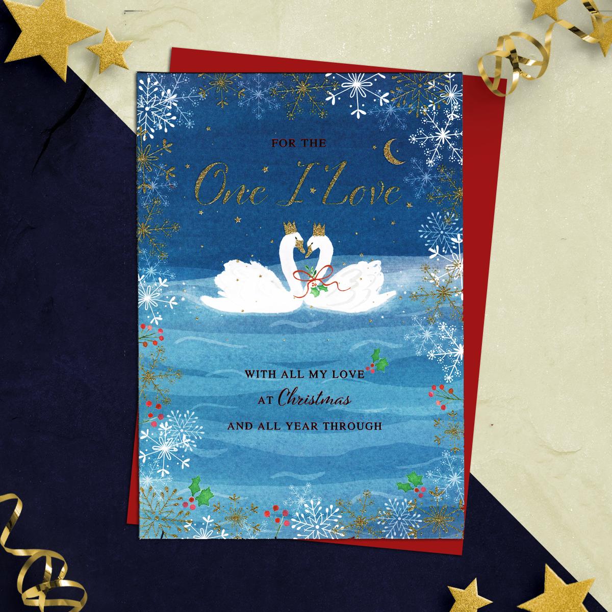 One I Love Festive Swans Christmas Card Alongside Its Red Envelope