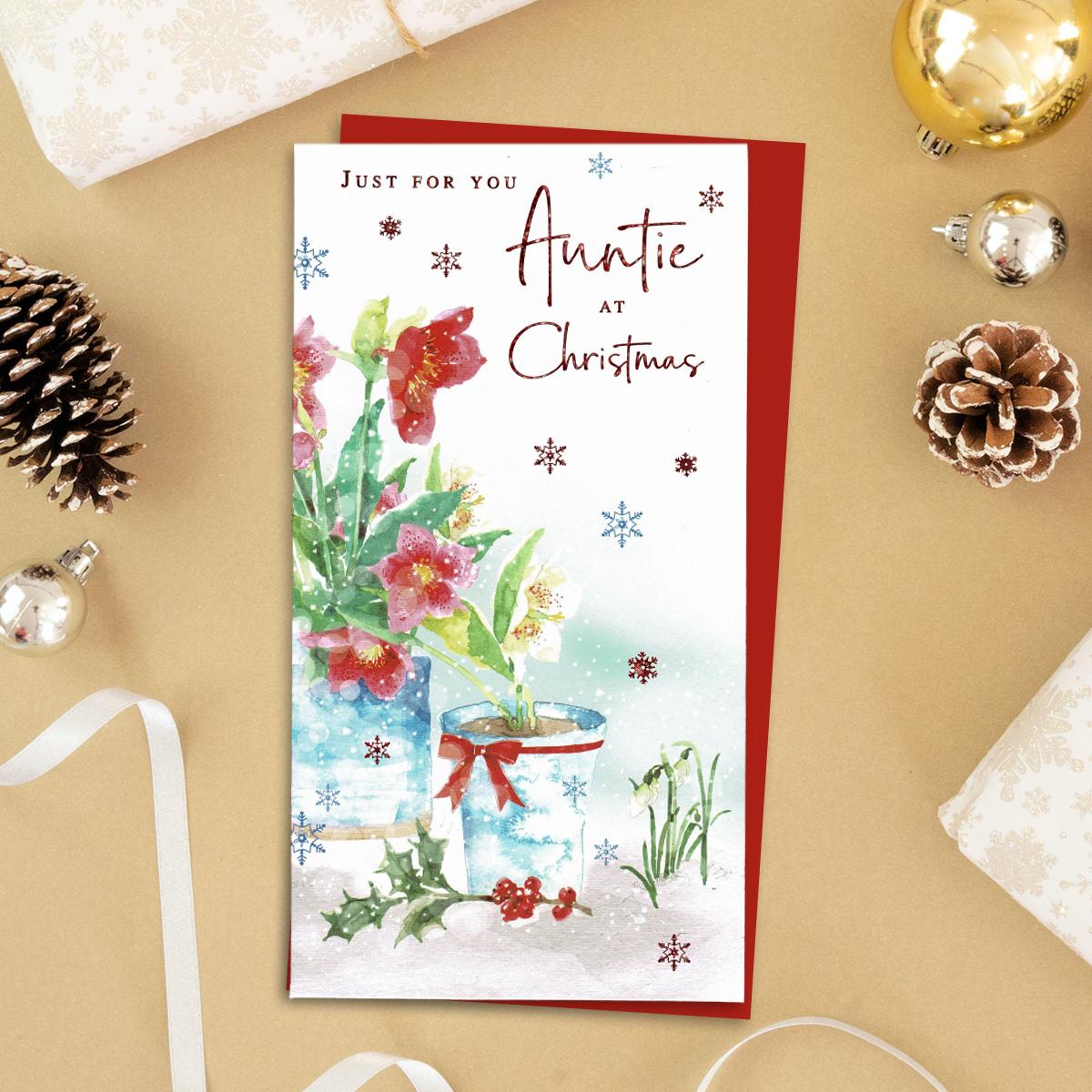 Just For You Auntie At Christmas Featuring Flowering Plants And Snowdrops. Finished With Red Foil Detail And Red Envelope