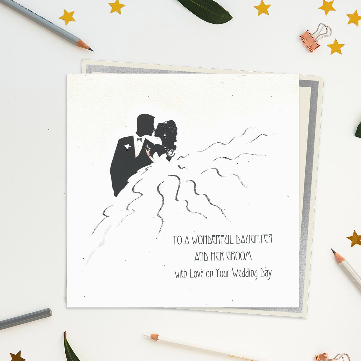 Stunning, Luxury, Handcrafted Wedding Day Card For A Wonderful Daughter And Her Groom. Showing A Couple In Silhouette With Added Gem Enhancement And Biodegradable Glitter Accents. Blank inside For Own Message. Warm White Envelope With Silver Border.