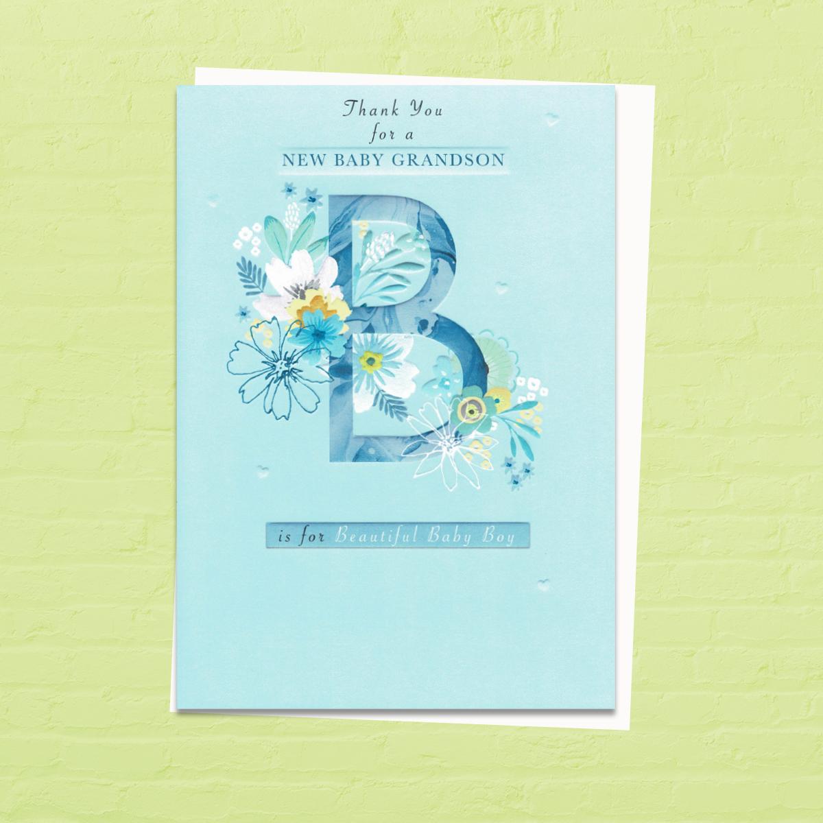 'Thank You For A New Baby Grandson B Is For Beautiful Baby Boy' Card. Featuring The Letter 'B' With Flowers All Around It. Embossed Detail.