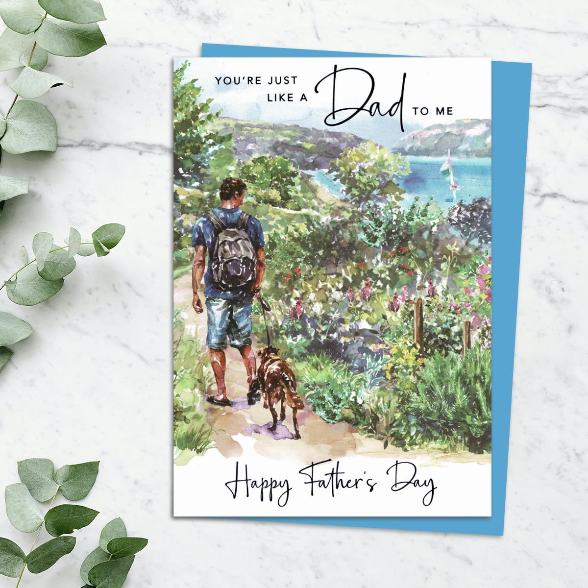 'You're Just Like A Dad To Me' Father's Day Card Featuring A Man Waling His dog Through The Hedgerow. With Added Blue Foiled Lettering And Blue Envelope