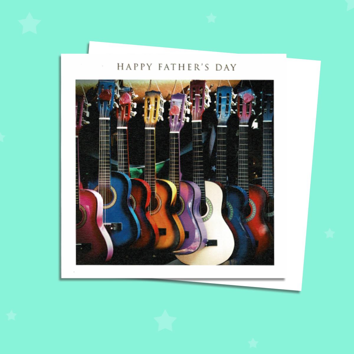 Fathers Day Card Featuring 8 Coloured Guitars Alongside Its Envelope