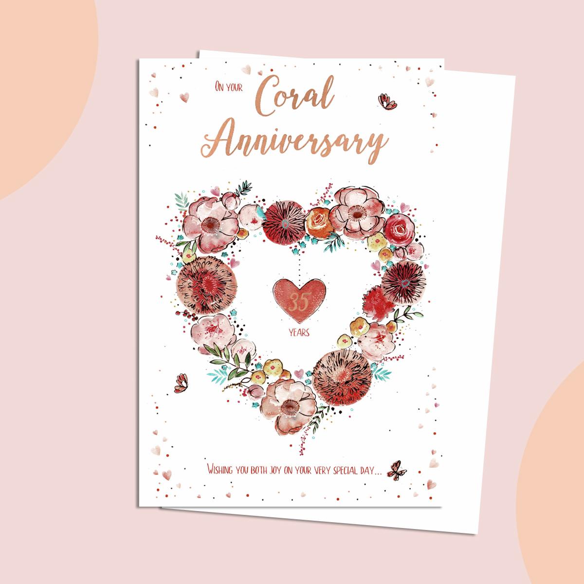 Coral Wedding Anniversary Card Featuring A Heart Made Out Of Coral Coloured Flowers