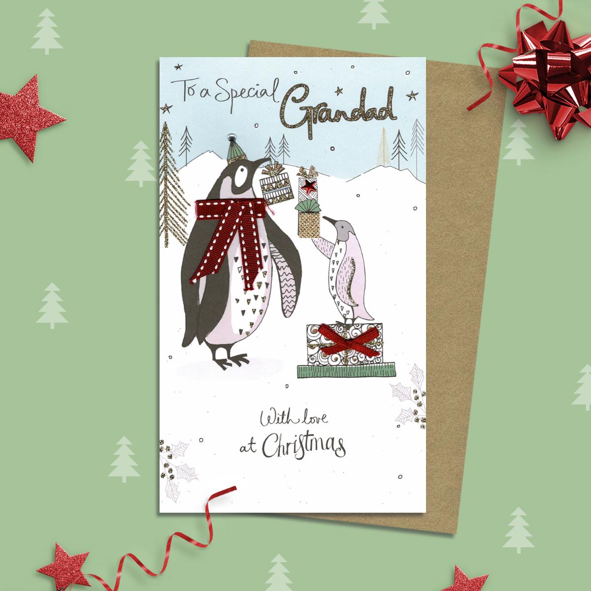 Grandad Penguin Themed Christmas Card Alongside Its Gold Envelope